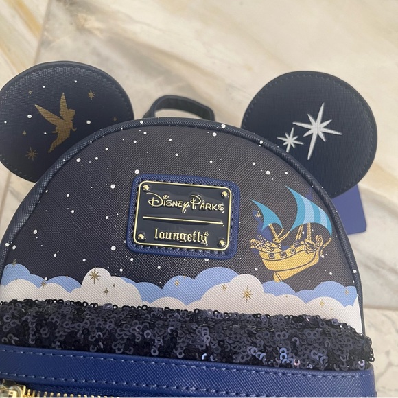 LOUNGEFLY NWT DISNEY PARKS MICKEY MAIN ATTRACTION PETER PAN’S FLIGHT BACKPACK - Picture 6 of 8